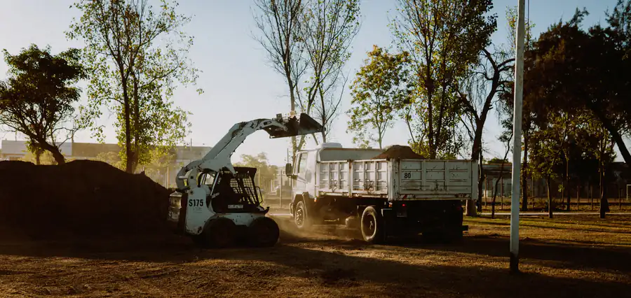 Skid steer crew on a land clearing job in Collin County Texas
